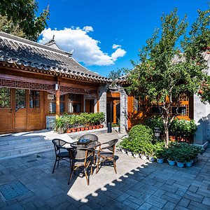 Manxin Hotel Beijing Qianmen Courtyard Dwellings in Beijing, image may contain: Resort, Hotel, Villa, Chair