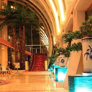 Bay Shore Hotel in Dalian, image may contain: Potted Plant, Shopping Mall, Hotel, Resort