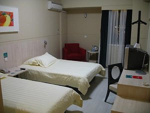 Jinjiang Inn (Shanghai Pudong Airport) in Shanghai, image may contain: Hospital, Chair, Furniture, Bed