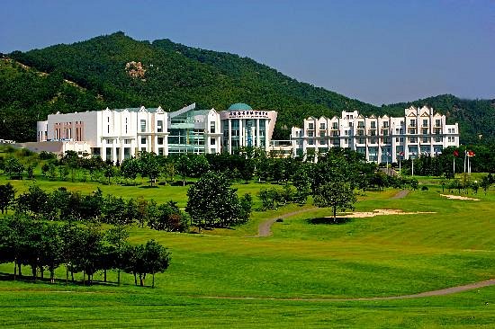 ‪Golden Pebble International Convention Center &amp; Resort‬، فندق في ‪Dalian‬