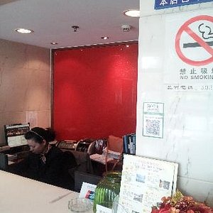 Joyful Star Hotel (Pudong Airport) in Shanghai, image may contain: Corner, Door, Bed, Dorm Room