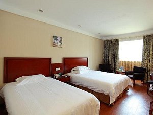 GreenTree Inn Hefei Chenghuangmiao in Hefei, image may contain: Furniture, Bed, Chair, Bedroom