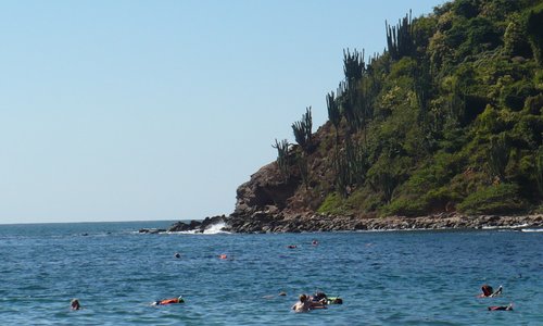snorkelers at Playa Coral on Isla Ixtapa