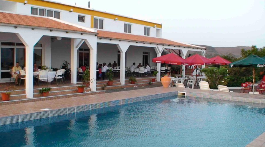 bar area and outside seating from poolside