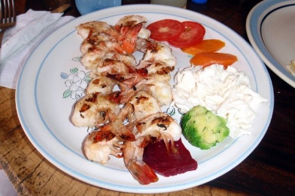 Evangeline's garlic butter grilled shrimp con legs.