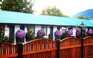Riverside Motel in Vancouver Island, image may contain: Purple, Villa, Hotel, Neighborhood