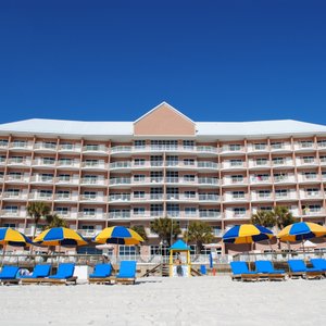 Palmetto Inn & Suites in Panama City Beach, image may contain: Hotel, Resort, Pool, Summer