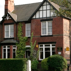 Eskdale Lodge in Sale, image may contain: Bed, Furniture, Bedroom, Corner