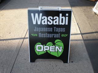 ワサビの店頭の看板です