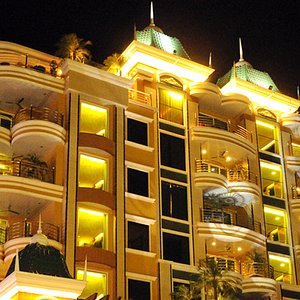 FPS condo-hotel facade at night