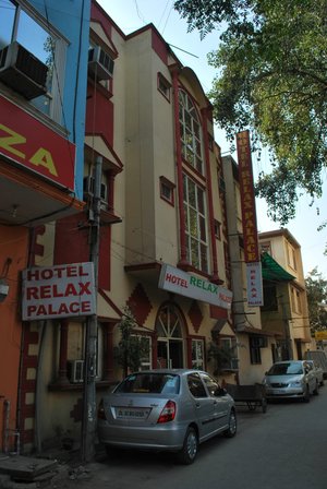 Hotel Relax Palace in New Delhi, image may contain: License Plate, City, Urban, Car