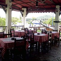 Taberna Mediterranea Bar Restaurant - Outdoor Terrace overlooking the Malecon and Marina in Sama