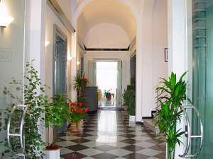Hotel Tirrenia in Viareggio, image may contain: Floor, Flooring, Corridor, Potted Plant
