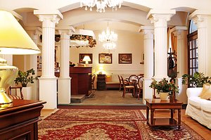 Fleur De Lis Hotel in Prague, image may contain: Home Decor, Lamp, Dining Room, Living Room