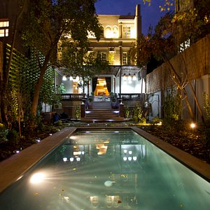 Casa Bueras Boutique Hotel in Santiago, image may contain: Villa, Lighting, Pool, City