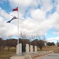 Under Australian and Merchant Navy flags