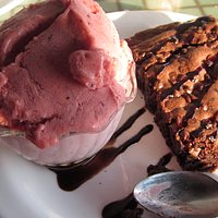 Brownie with wild berry gelato