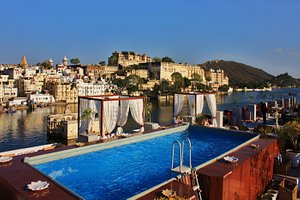 Lake Pichola Hotel in Udaipur, image may contain: Resort, Hotel, Waterfront, Pool