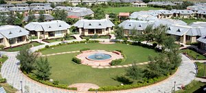 Shri Radha Brij Vasundhara - The Resort & Spa in Goverdhan, image may contain: Resort, Hotel, Building, City