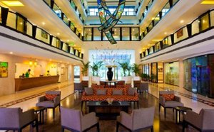 Lemon Tree Hotel, Indore in Indore, image may contain: Dining Room, Dining Table, Shopping Mall, Restaurant