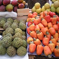 fruta de conde (left), cashews on right