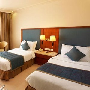 The Royale Senate in Bengaluru, image may contain: Cushion, Home Decor, Furniture, Hotel