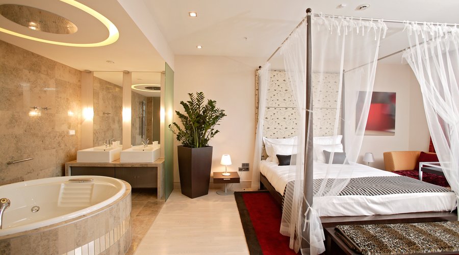 Luxury Presidential Suite bedroom with Jacuzzi