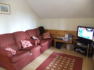 The living area, sofas were a bit old but comfy and nice modern TV