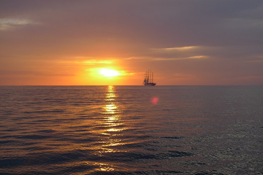 trimaran sunset sails