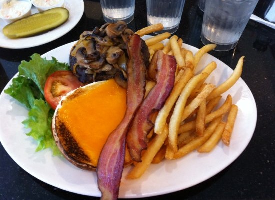 burger with bacon, cheese, mushrooms and fries