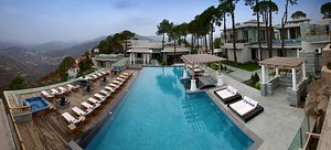 Moksha Himalaya Spa Resort in Parwanoo, image may contain: Resort, Hotel, Pool, Villa