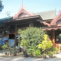 The ticket office is at the front left of this building