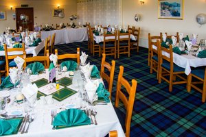 Carnegie Lodge Hotel in Tain, image may contain: Dining Table, Table, Tablecloth, Dining Room