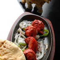 pollastre desosat i marinat fet al tandoori