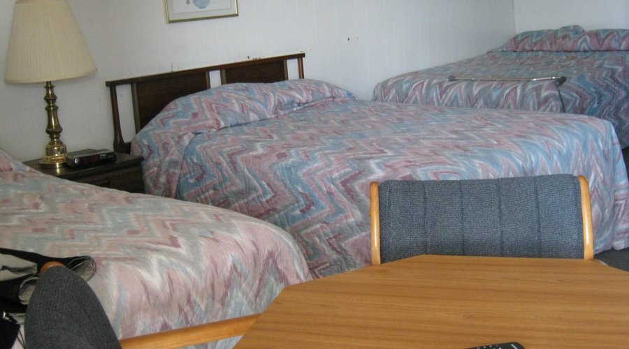 Room 11 looking away from door towards beds
