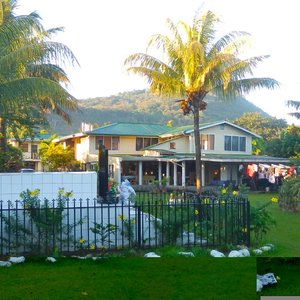 Garden, family grave and backpackers building
