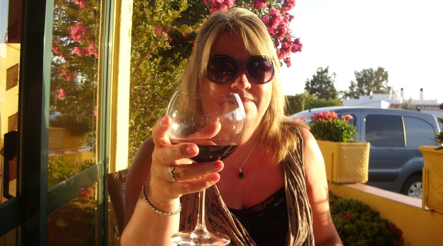 enjoying a glass of wine