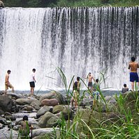The falling curtain of water attracts those with courage, others enjoy it from safe distance