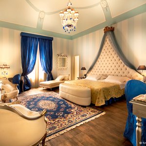 Relais Antica Badia - San Maurizio 1619 in Sicily, image may contain: Linen, Home Decor, Furniture, Bedroom