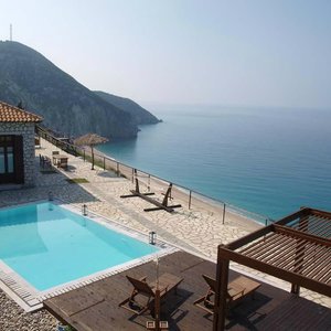 stone villa with pool