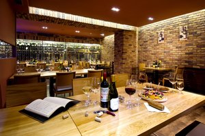 Hotel Turiec in Martin, image may contain: Restaurant, Table, Dining Table, Wine Bottle