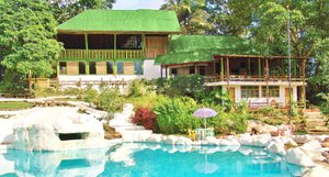 Hosteria El Paraiso de las Orquideas in Archidona, image may contain: Hotel, Resort, Building, Villa