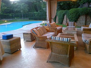 House of Waine in Nairobi, image may contain: Couch, Backyard, Resort, Chair