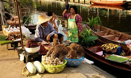 Some of the boats selling food
