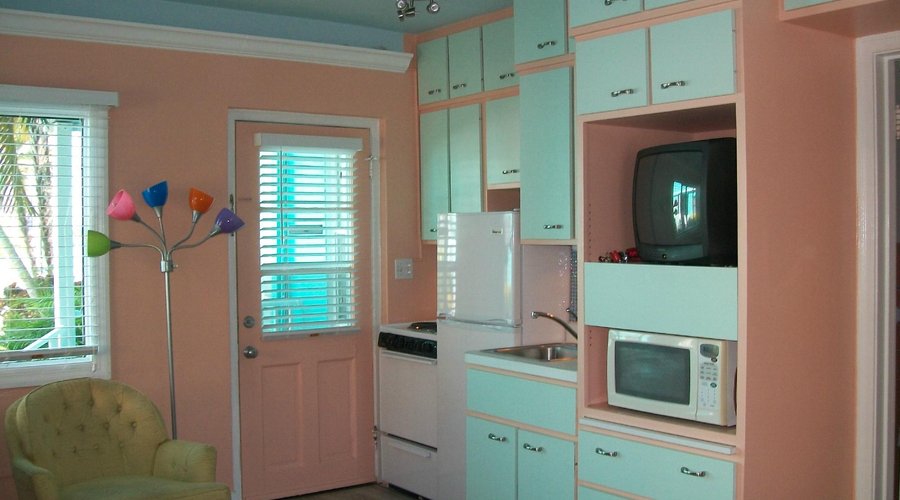 Front door with kitchenette on right.