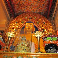 Statue of Lord Buddha in the sacred Dalai Lama Temple