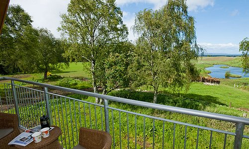 The balcony features superb views over the loch and out towards the Moray Firth