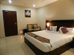 TSG Grand Hotel in South Andaman Island, image may contain: Corner, Bed, Furniture, Hotel