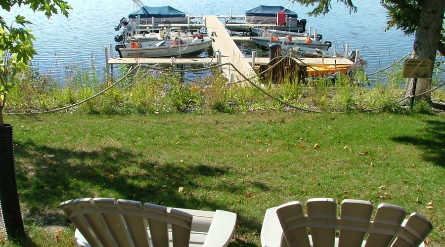 view of lake and dock