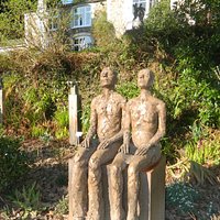 some of the sculptures and hotel in background